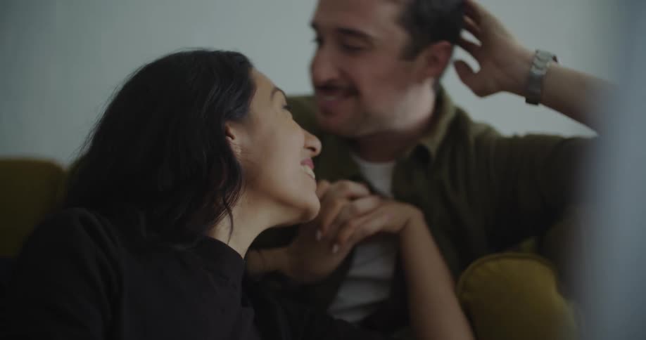 A young couple is being affectionate with each other
