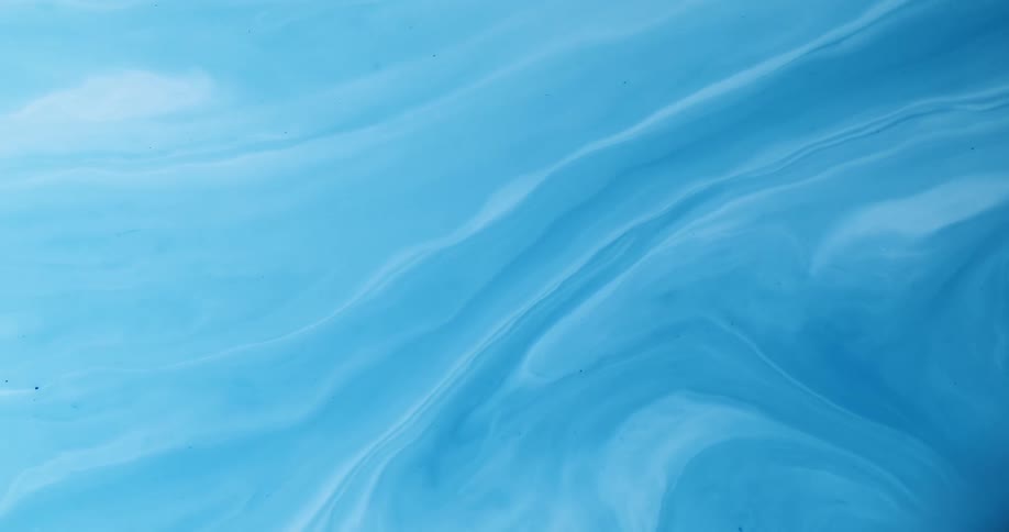 Abstract footage of blue liquid swirling together
