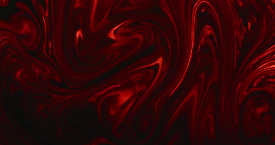 Red liquids is being mixed together
