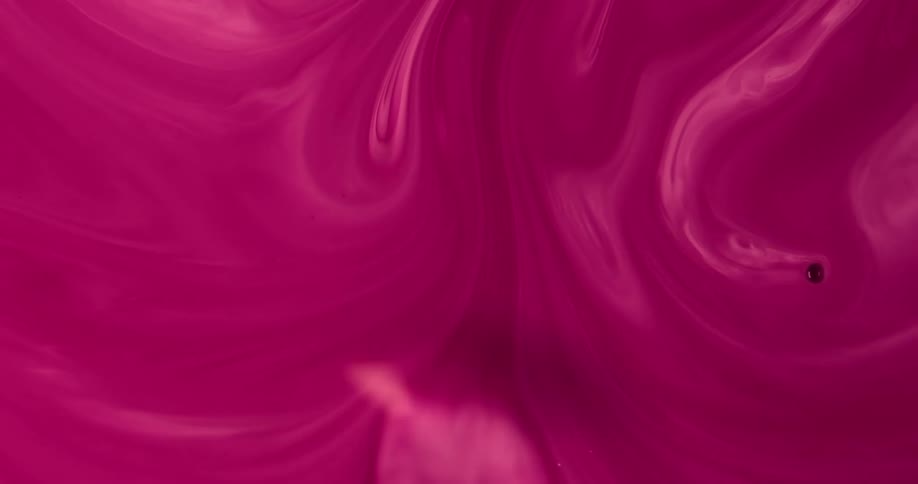 A pink liquid gets injected with clearer pink liquid