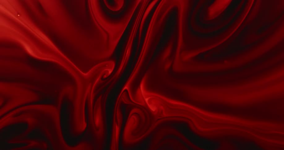 Red and black colors swirl together to form a pattern