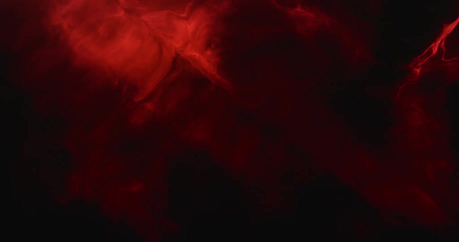 Black and red flows against a dark background in a mixture