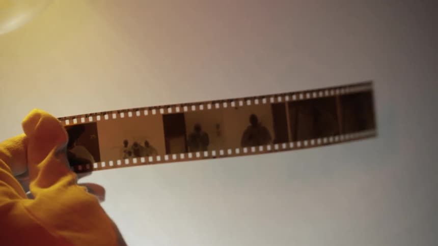 Rubber gloves sliding out negative slides for viewing