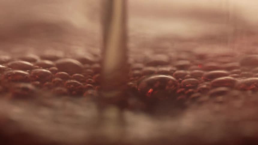 Beer is foaming as it pours