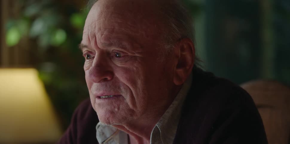 A man appears frustrated while speaking at home