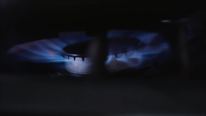 A gas burner lights up