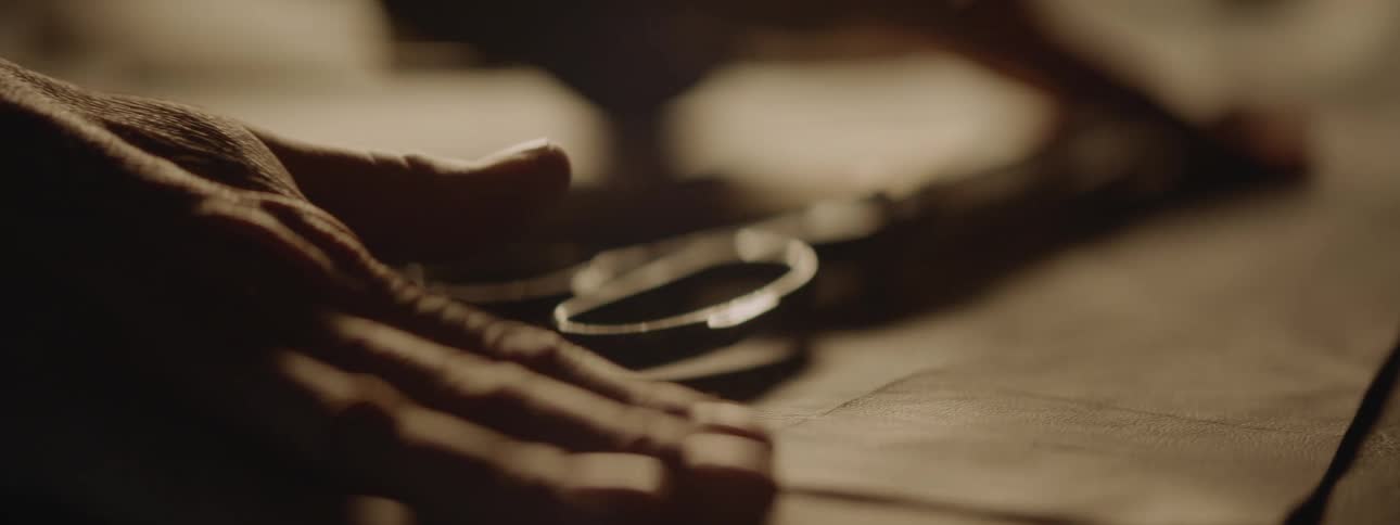 A person touches the fabric