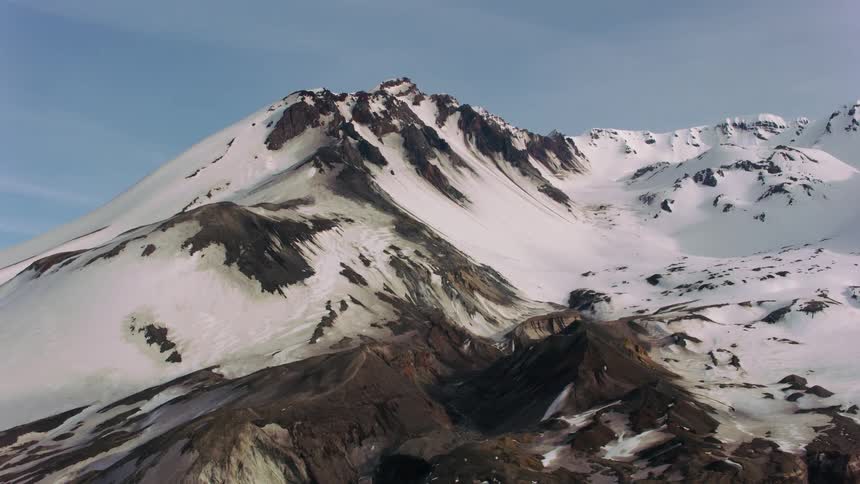A snowy mountain summit