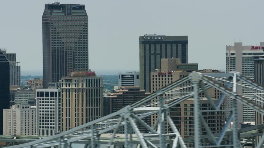 Aerial view of high rise buildings and bridge in the city