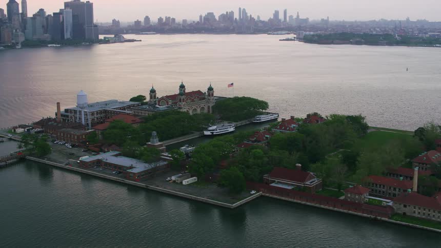 Aerial view of the ellis island museum in new york city at evening