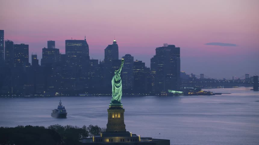 The view is of the downtown area and can see the statue of liberty