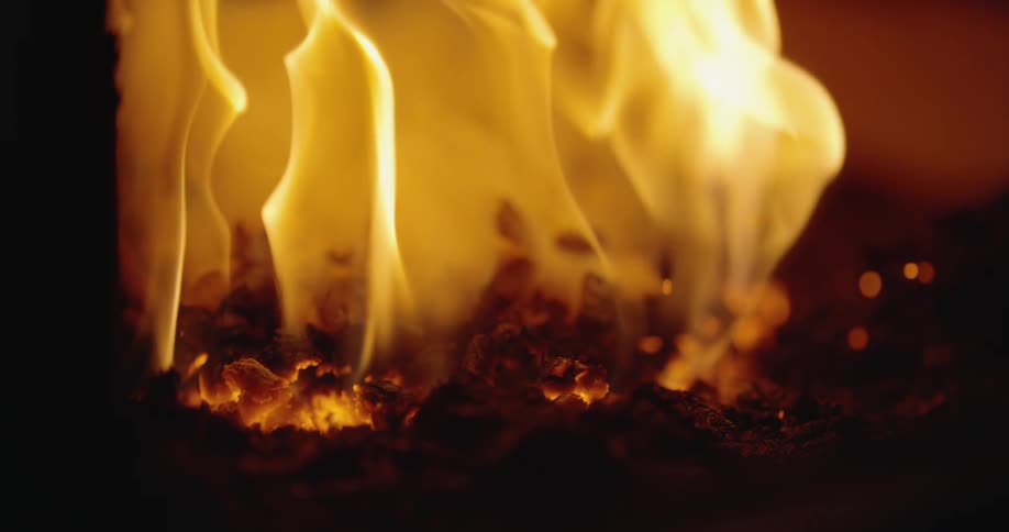A bonfire burning coal in slow motion