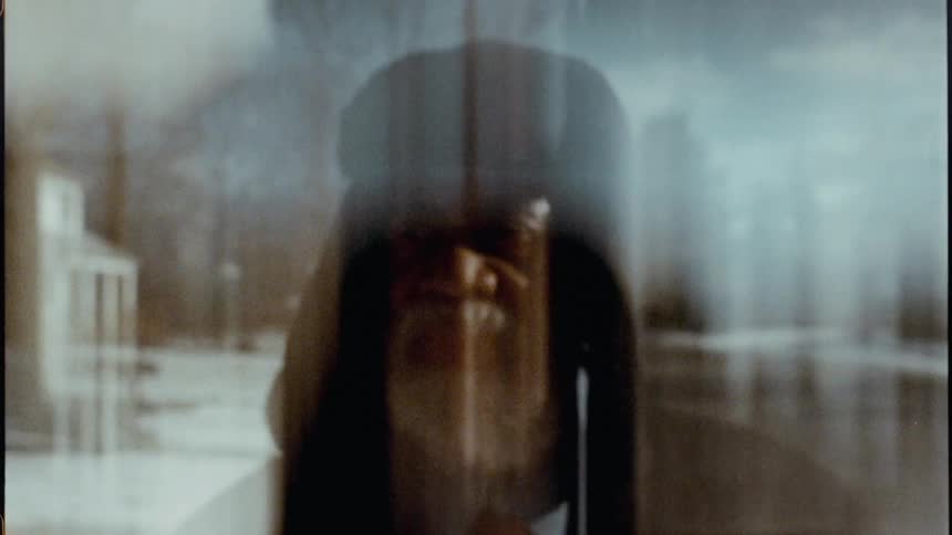 A man is walking outside