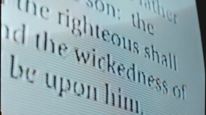Close up of vintage tv screen with scan lines and the words from ezekiel 1820 on the screenthe righteousness of the righteous shall be upon him and the wickedness of the wicked shall be upon him