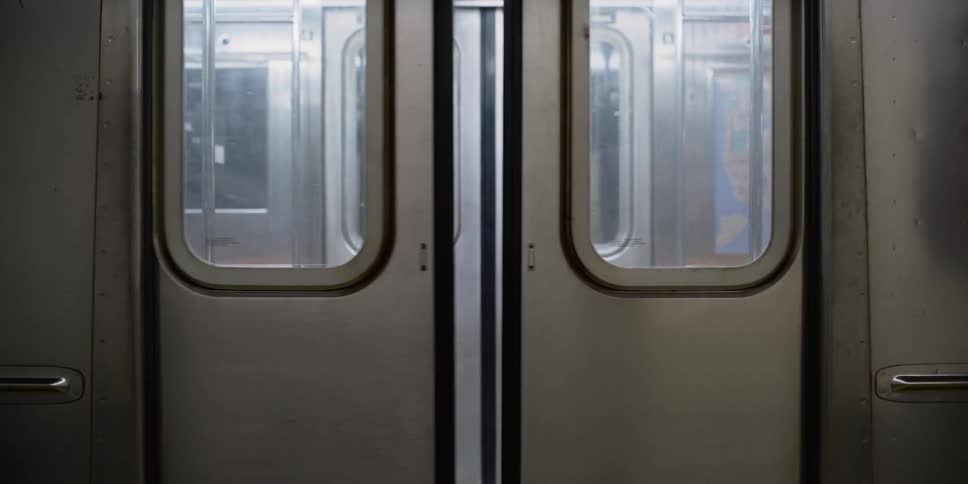 Train doors closing on a train