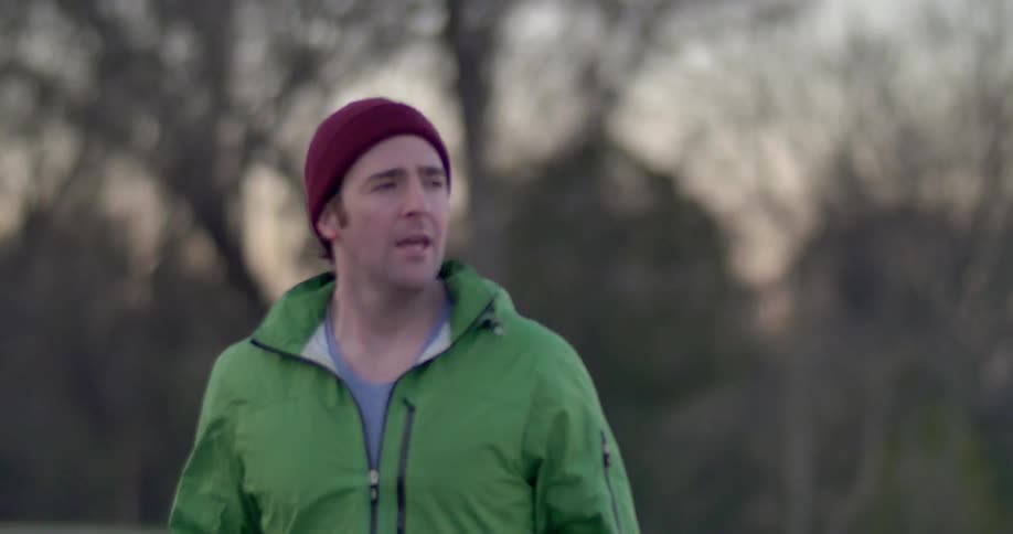 A man jogs in cold weather