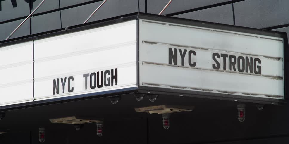 A sign outside a new york city business offers encouragement to residents