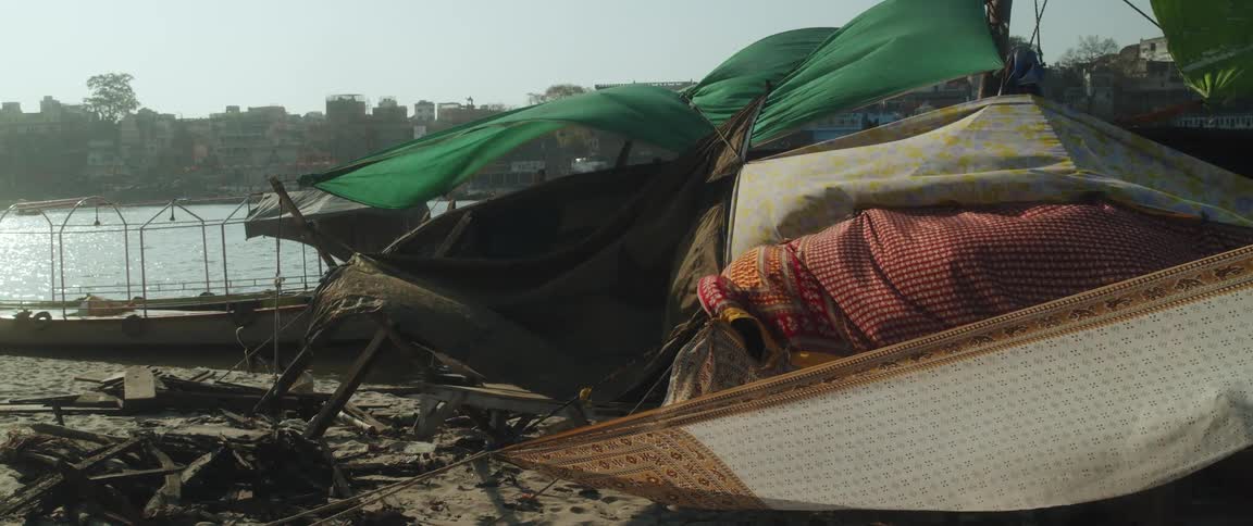 Wind blows through makeshift tents in a developing country