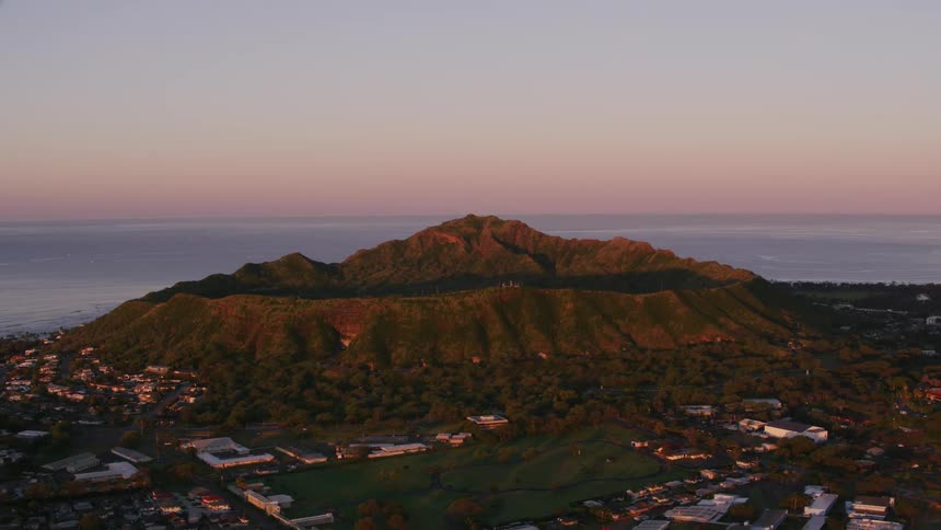 Aerial view of houses near the beach during dusk
