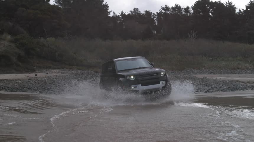 Slow motion view of a car off road driving