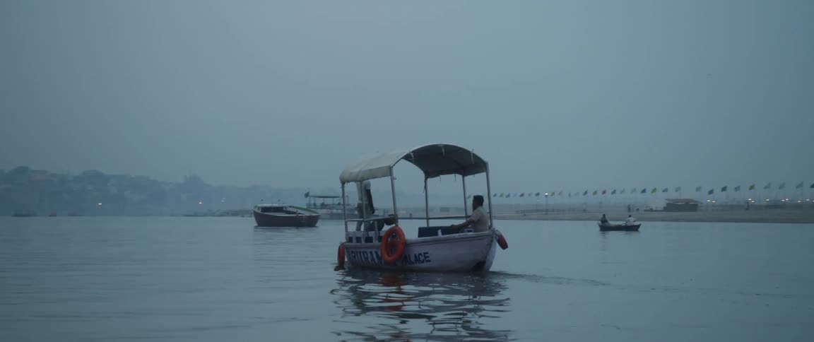 Boat float on water off the coast