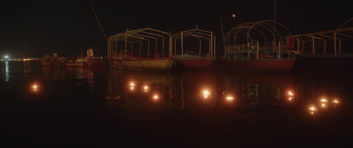 Boats lay at anchor in the harbour