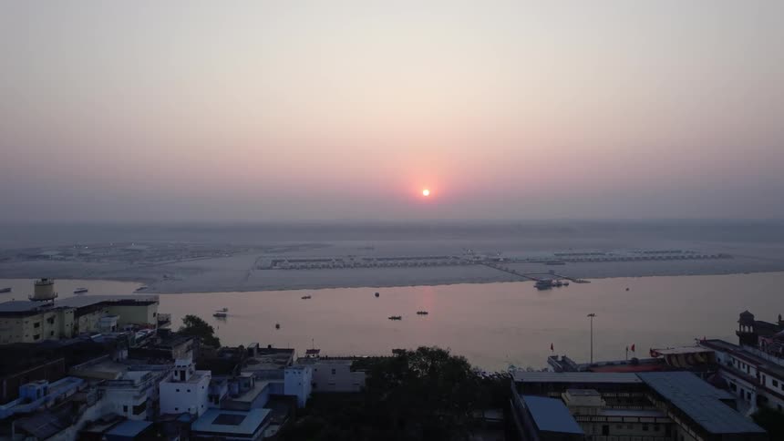 Aerial view of coastal city at sunrise