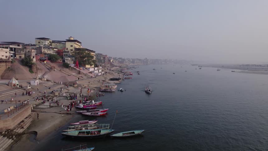 Boats are all docked on the shore