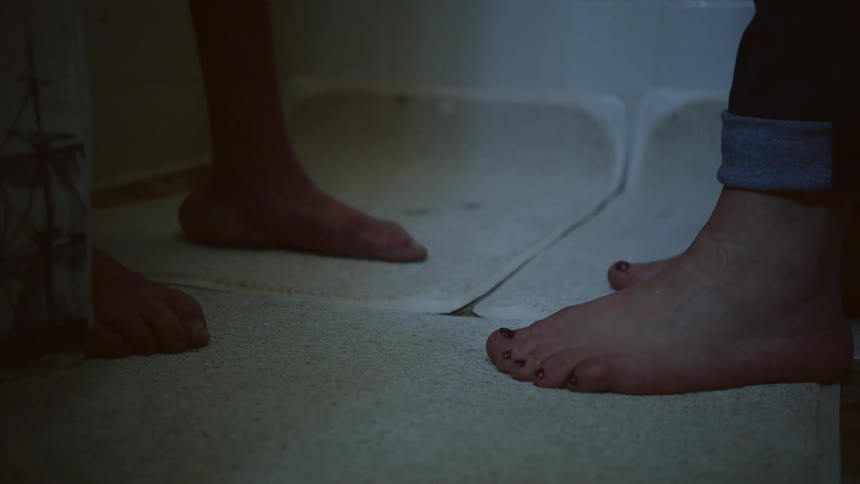 Feet of disabled man and woman