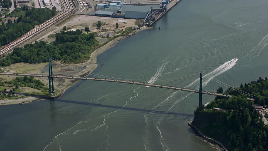 A road bridge over a river with intense traffic