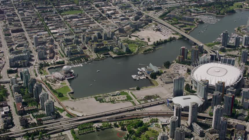 A lake and a sports arena at the center of a major city