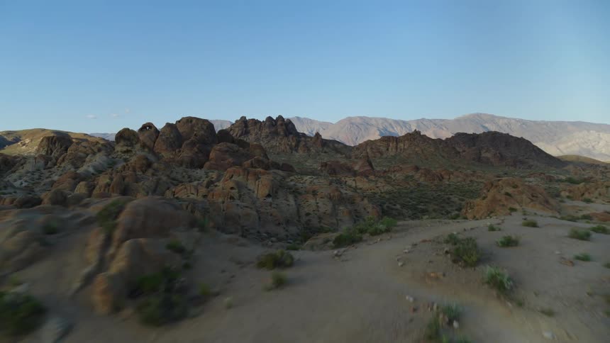 Rocky terrain covered in grass and dirt