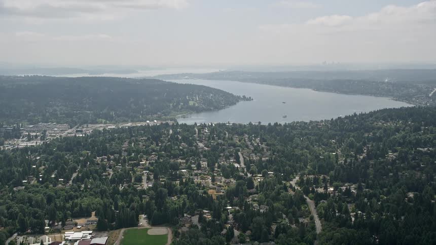 An aerial view of a suburban neighborhood and Lake Washington in Brier Washington