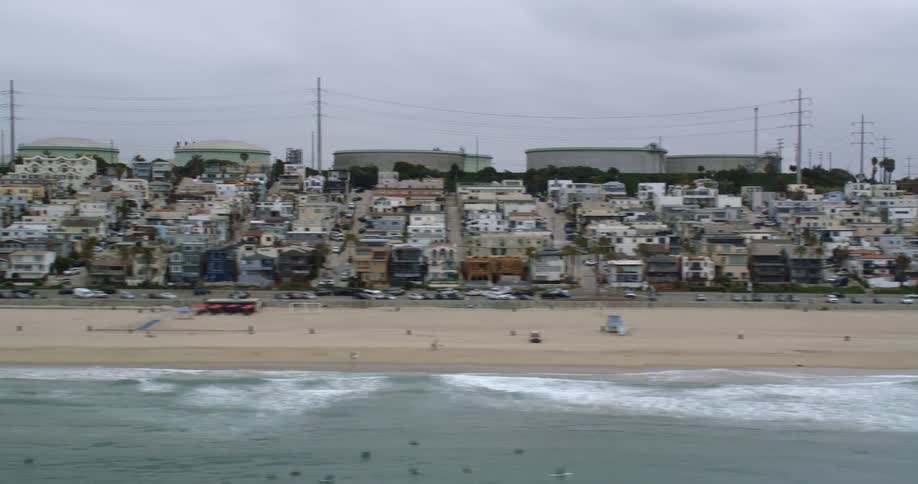 Aerial view of coastal town and beach near the sea