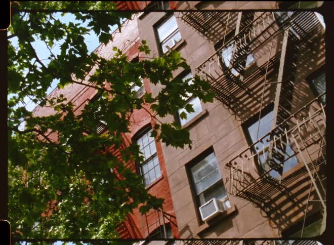 Exterior view of apartment buildings with fire escape