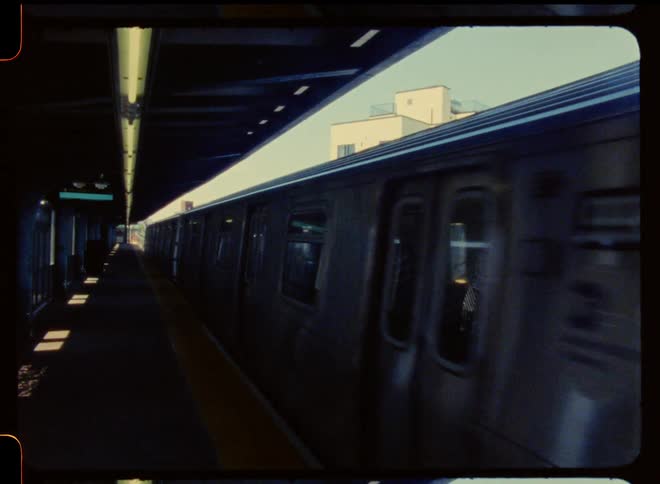 The view is of a train station around the day time