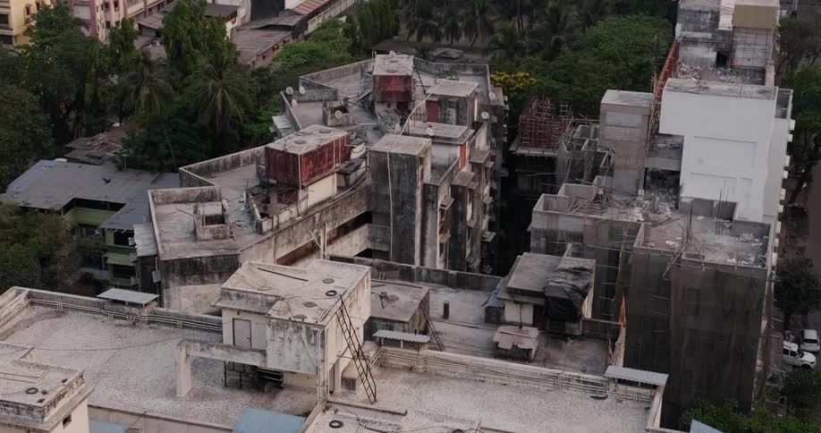 Aerial view of worn buildings in the street