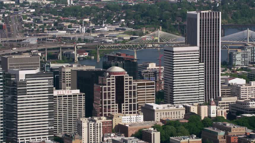 The buildings are lined up before the bridge