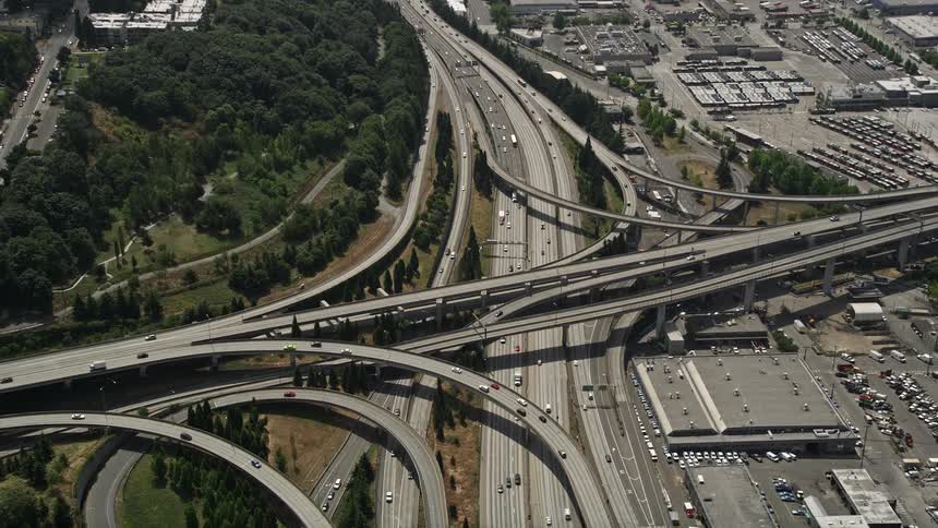 Aerial footage of light traffic on the I-5 and I-90 Express interchange in Seattle Washington