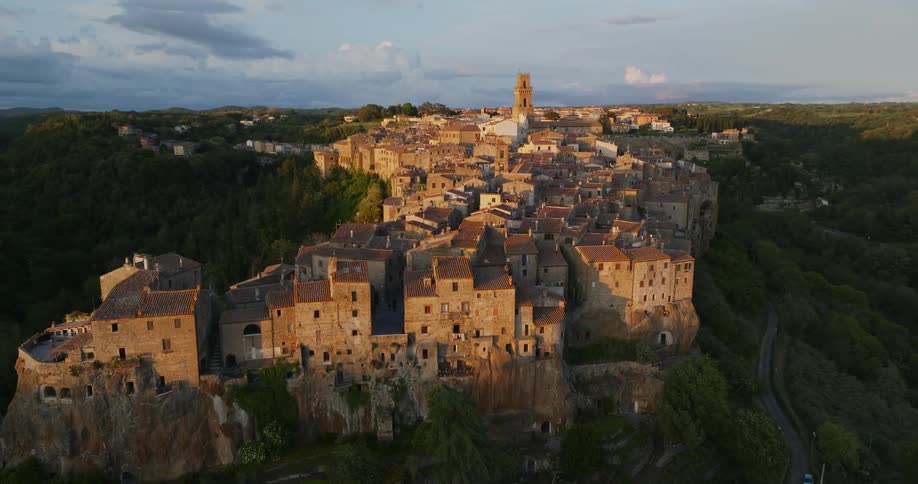 A historical town sits on a cliff in a canyon