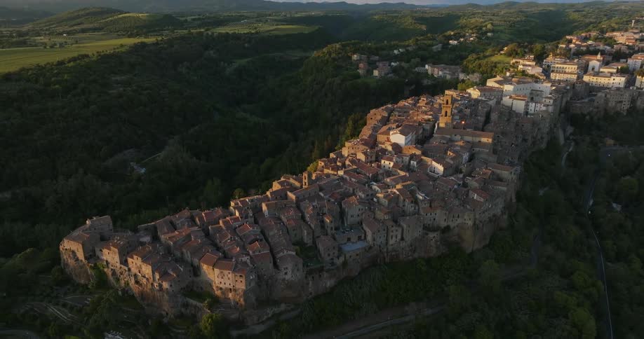 Buildings sit close together atop a cliff