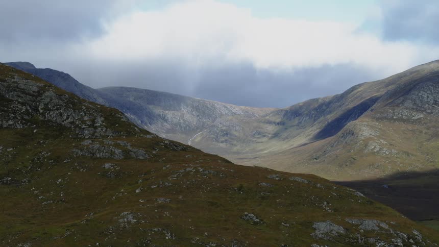 Aerial view of barren mountains and a valley