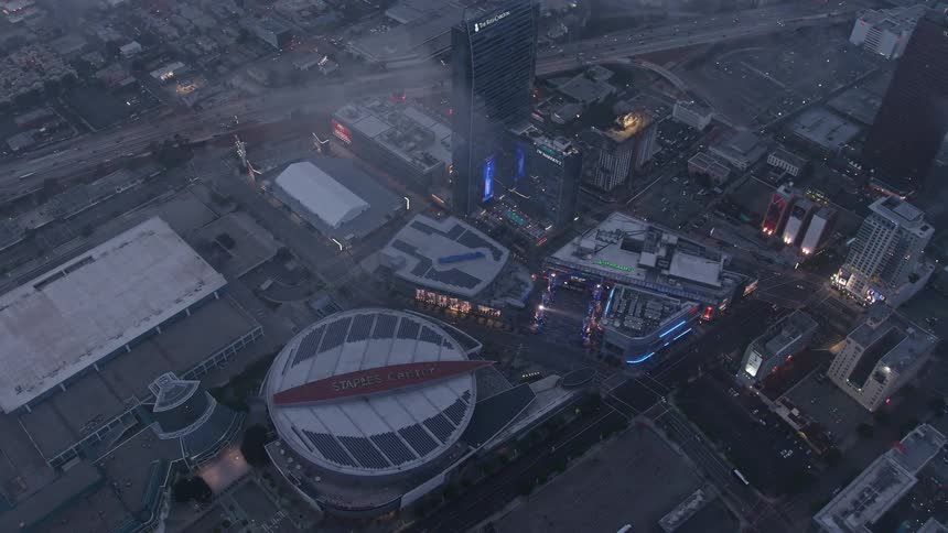 Beautiful twilight aerial view of the Staples Center and Nokia Theater surrounded by a marine layer in Downtown Los Angeles perfect for sightseeing and enjoyment