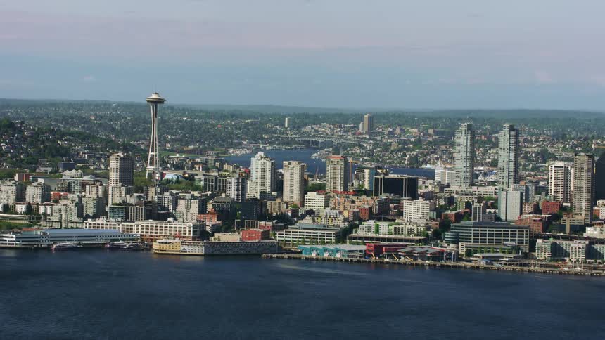 An aerial view of the seattle skyline and its architecture along the waterfront