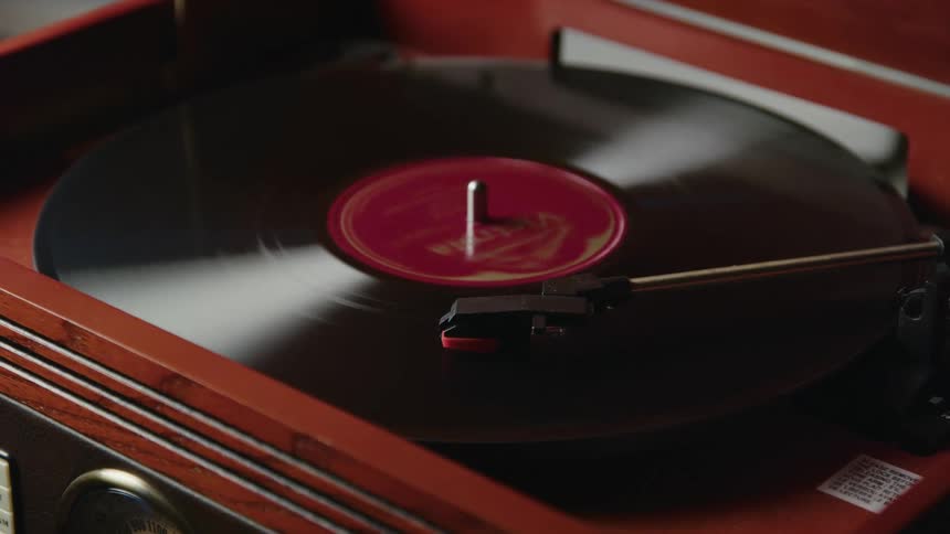 An album spins on a record player
