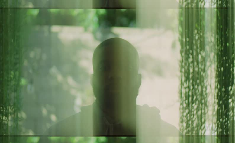 A mans face is blurred