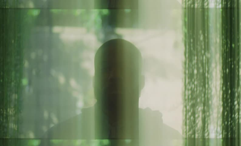 A mans face is blurred