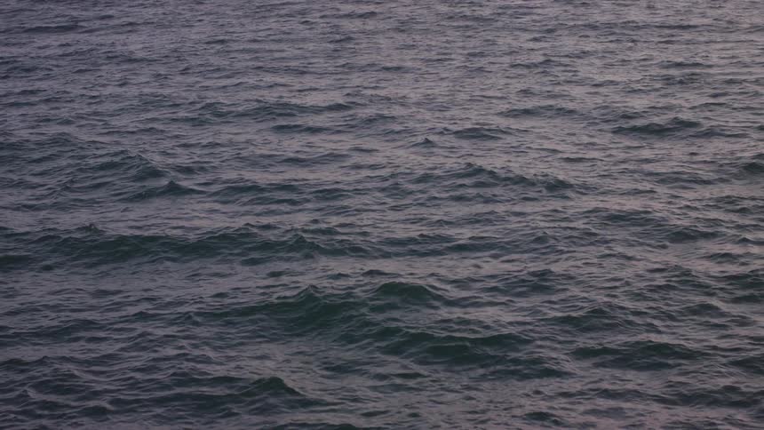 Small ocean waves cresting