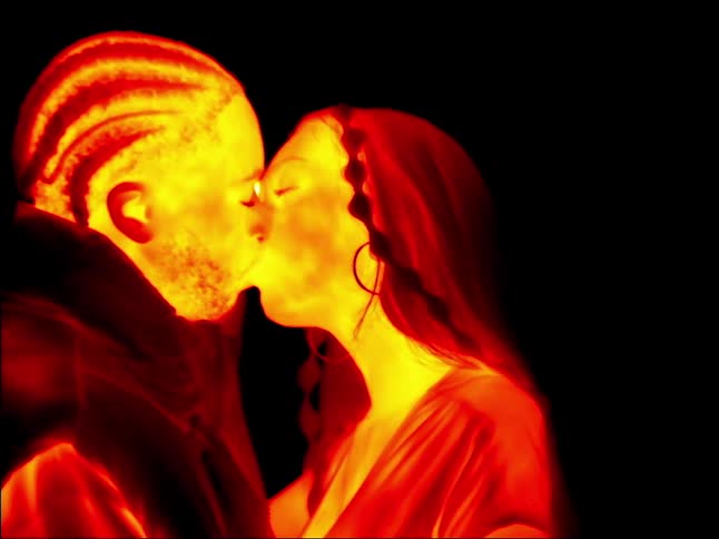 A couple kiss under the infrared