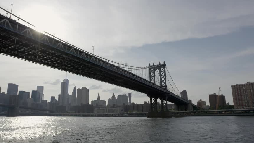 A bridge leads to a large city
